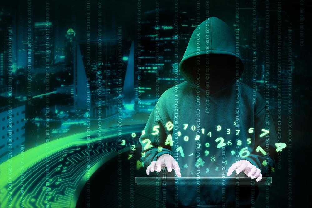 Man,In,Hoodie,Shirt,Is,Hacker.,Computer,Security,Concept
